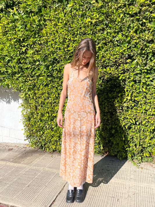 girl in ecru floral maxi dress