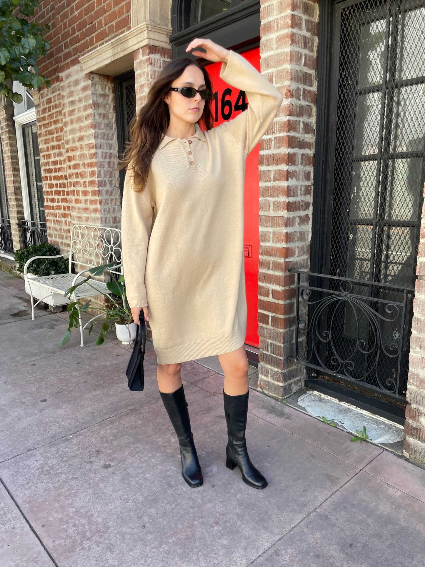 girl in tan sweater dress