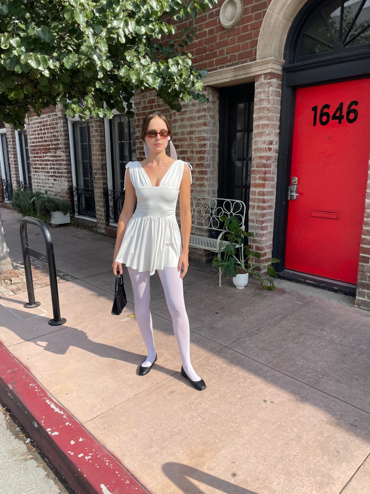 girl in white dress and white tights