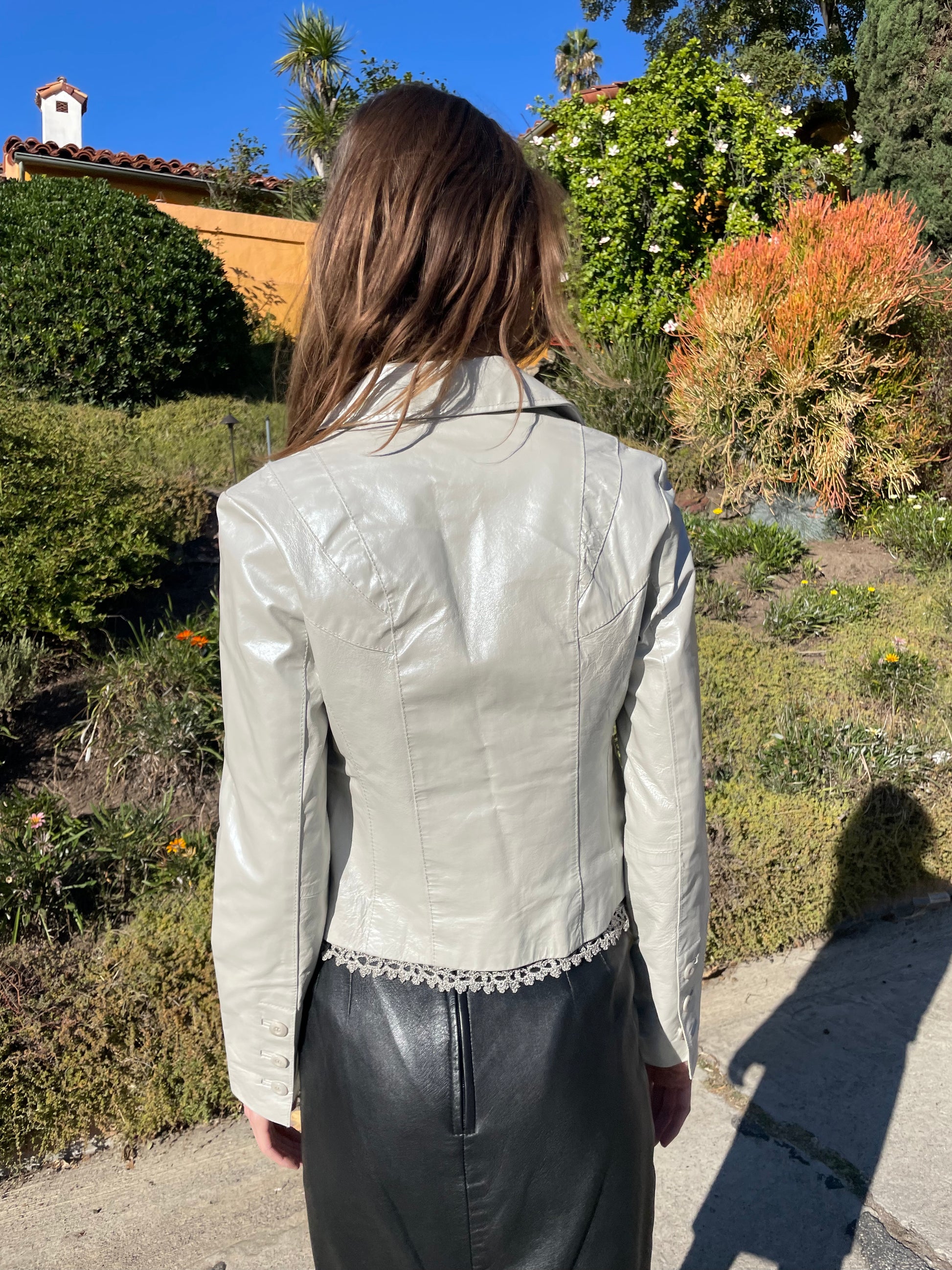 girl in silver leather jacket