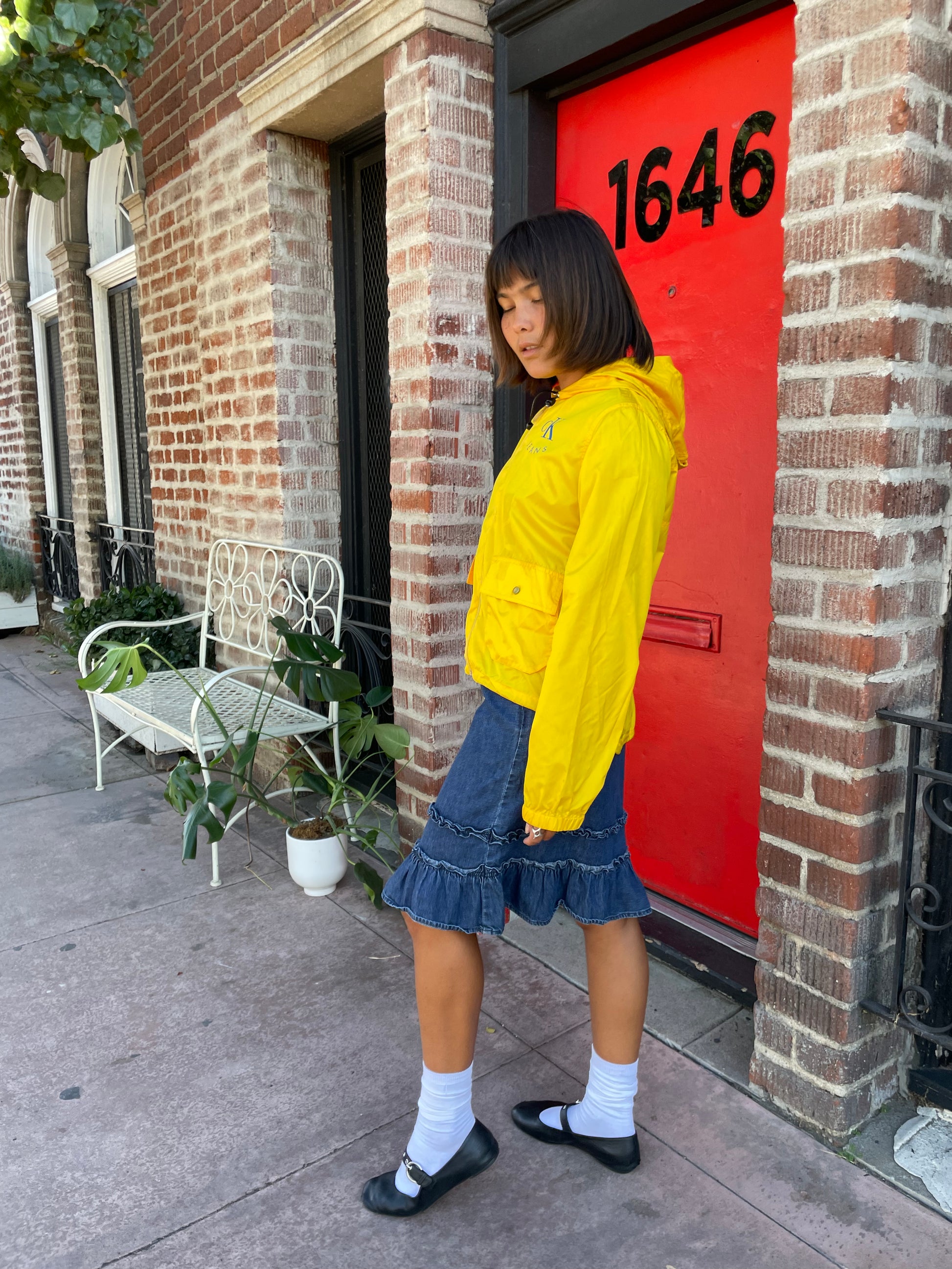 girl in denim ruffle skirt