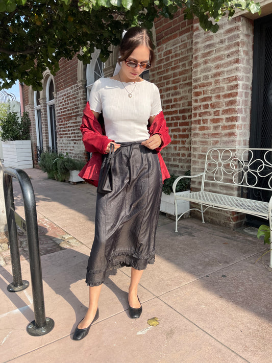 girl in white t-shirt and black skirt