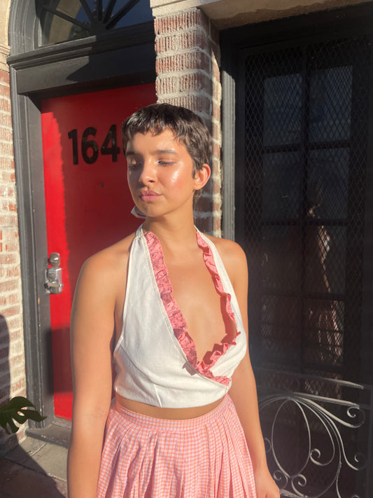 girl in cream and pink halter