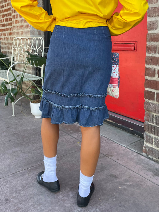 girl in denim ruffle skirt