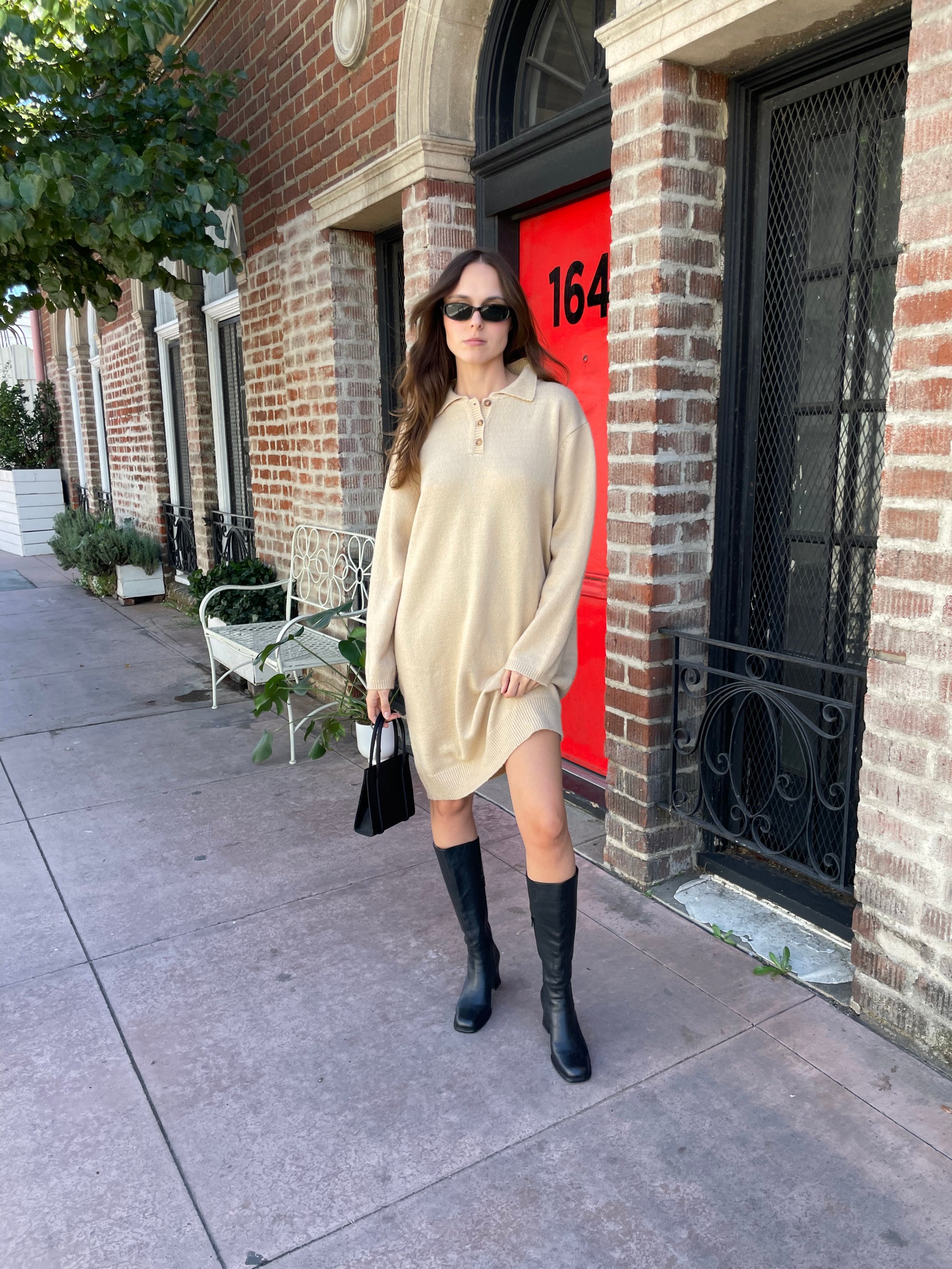 girl in tan sweater dress