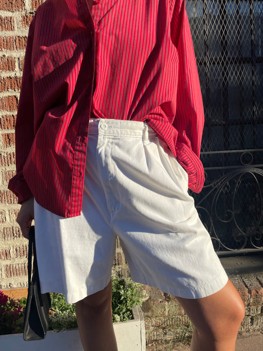 girl in red short and white shorts