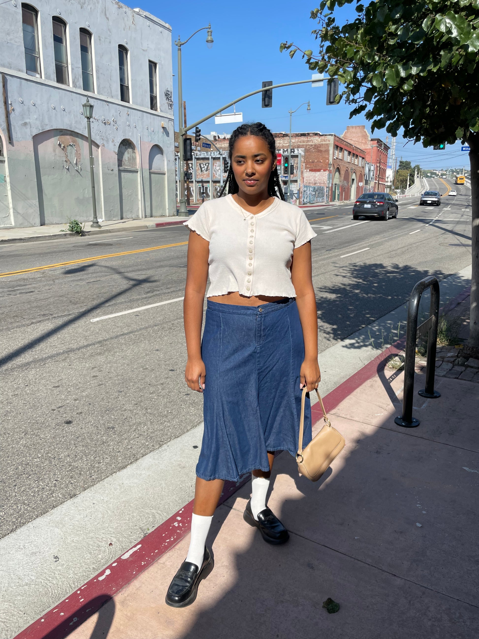 girl wearing denim skirt