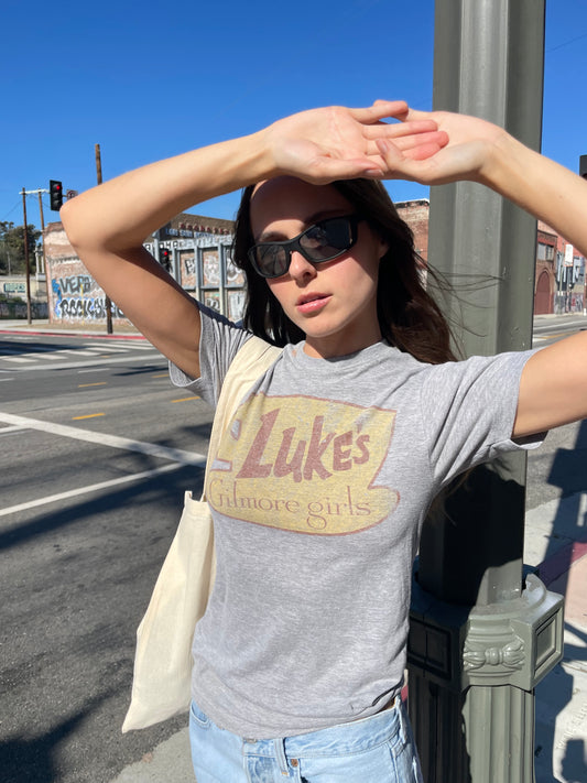 girl in vintage gray shirt