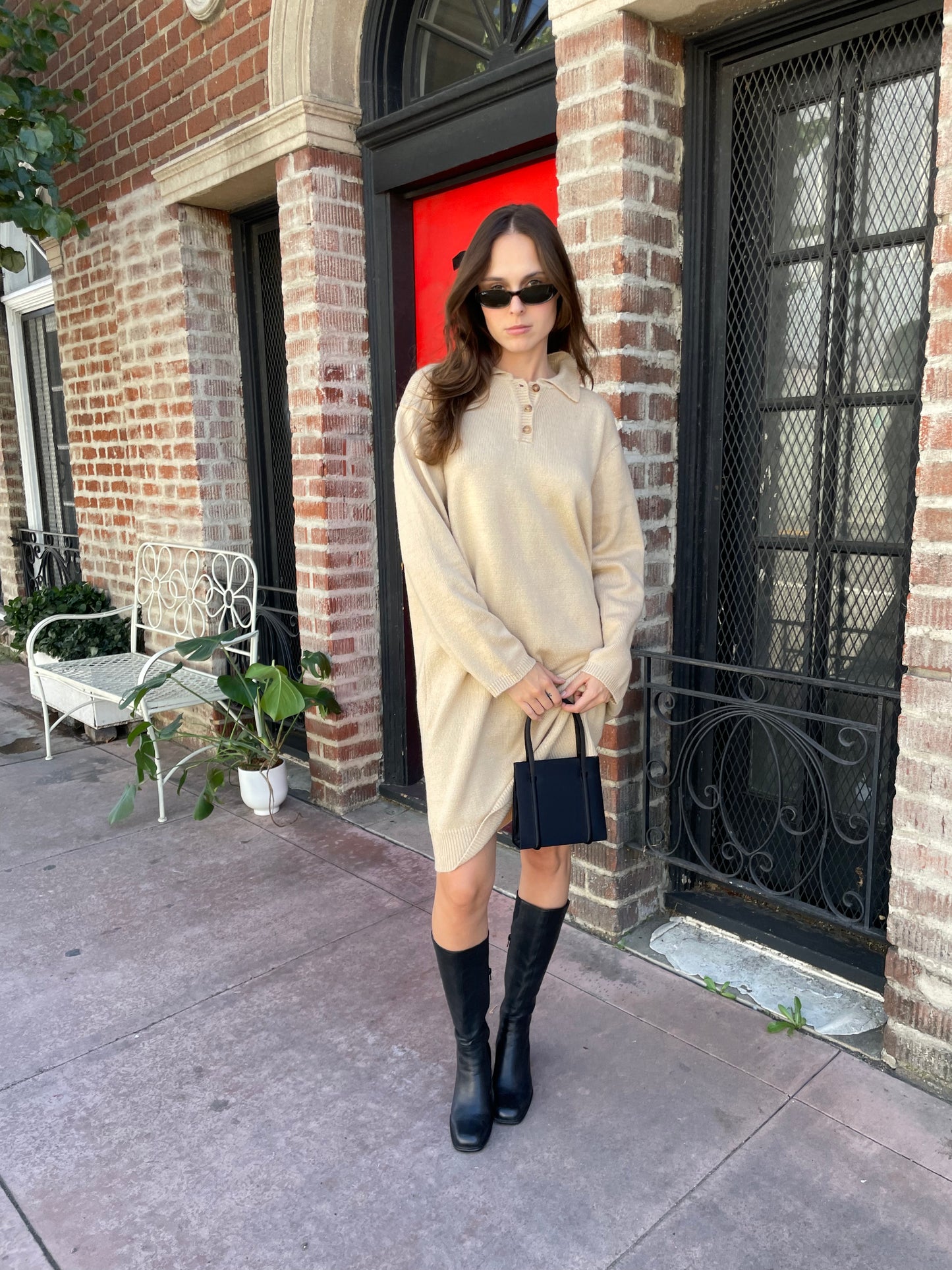 girl in tan sweater dress