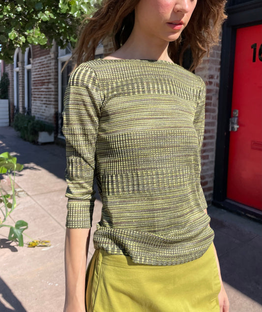 girl in green long sleeve and green skirt