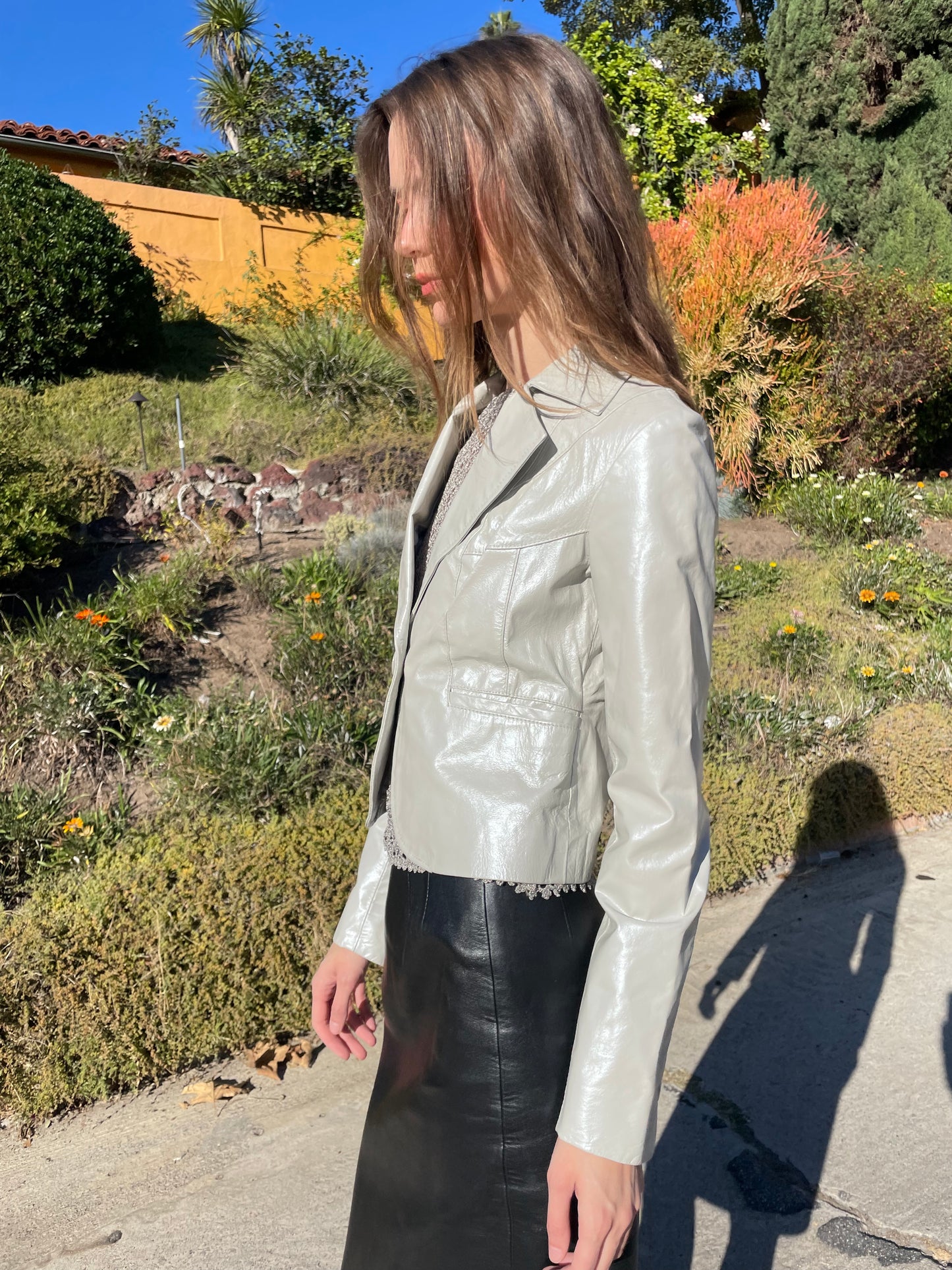 girl in silver leather jacket