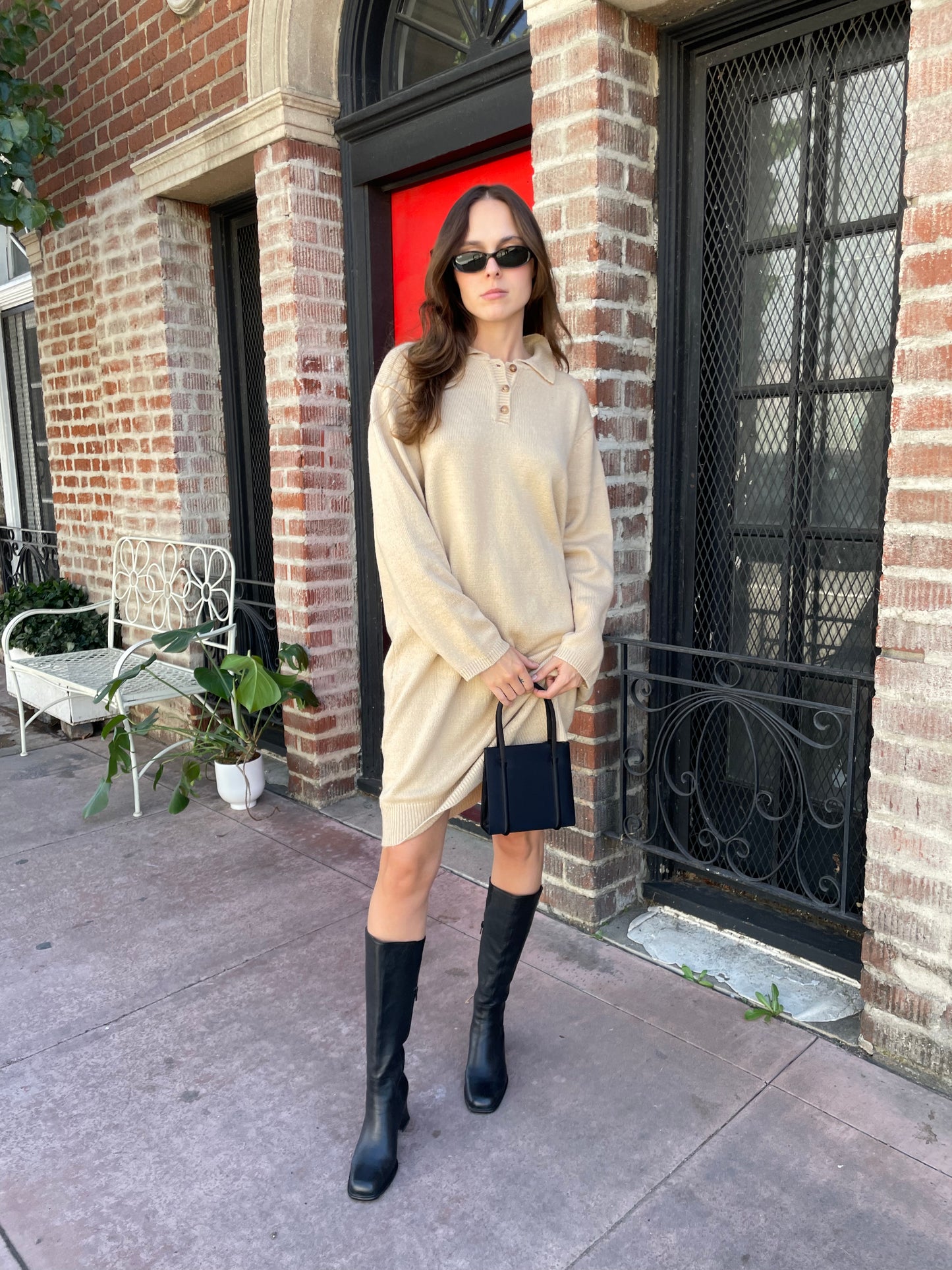 girl in tan sweater dress