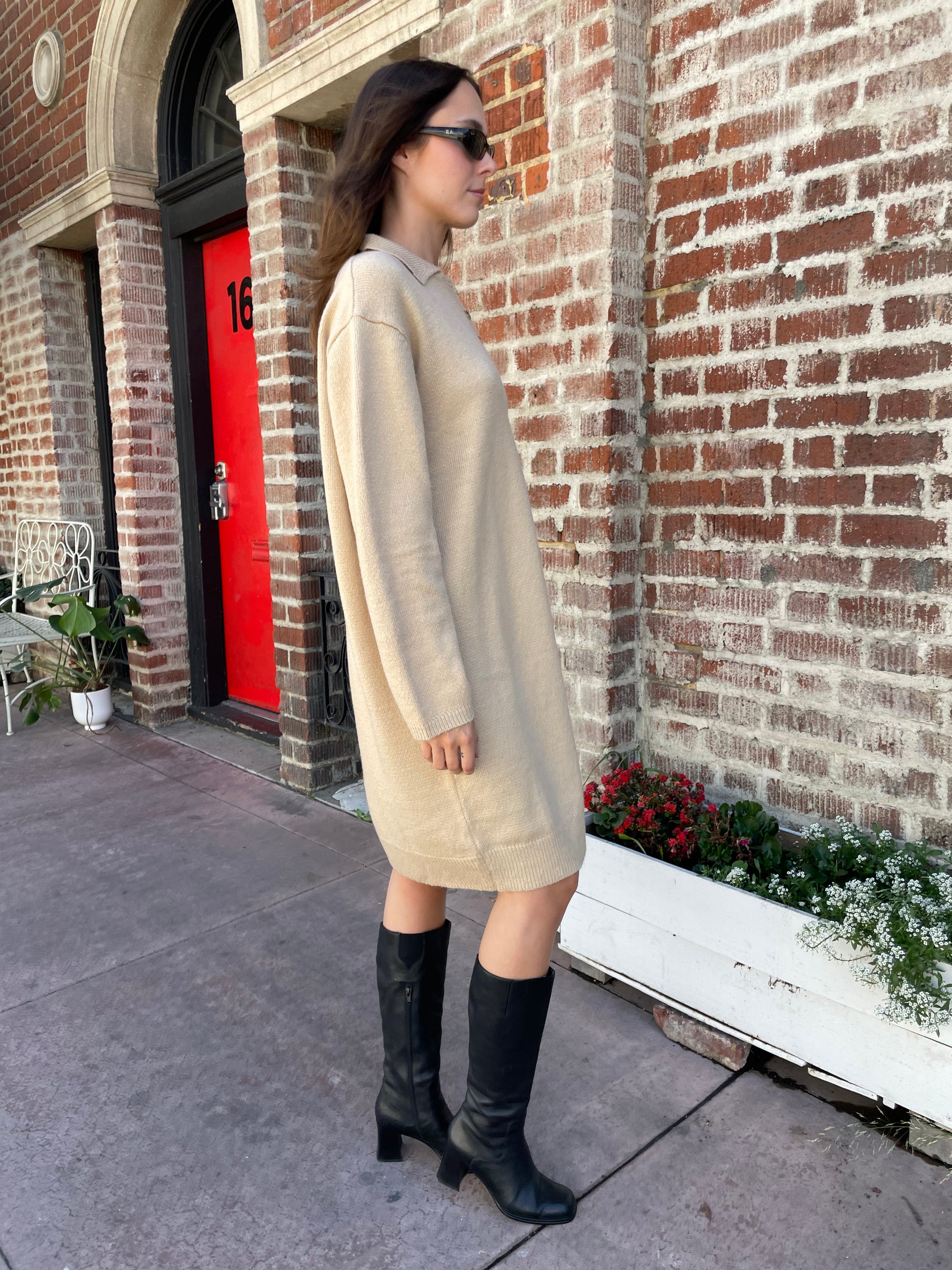 girl in tan sweater dress