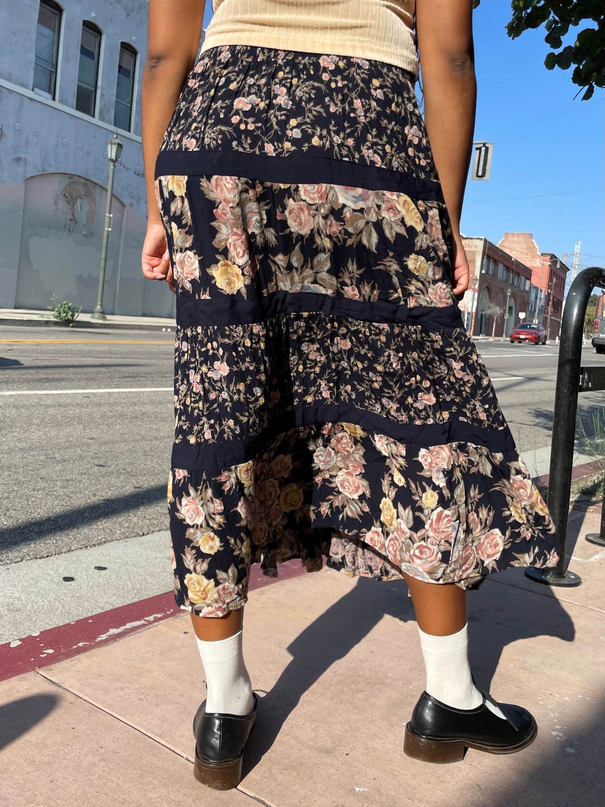 Girl wearing 90s Black Floral Print Skit