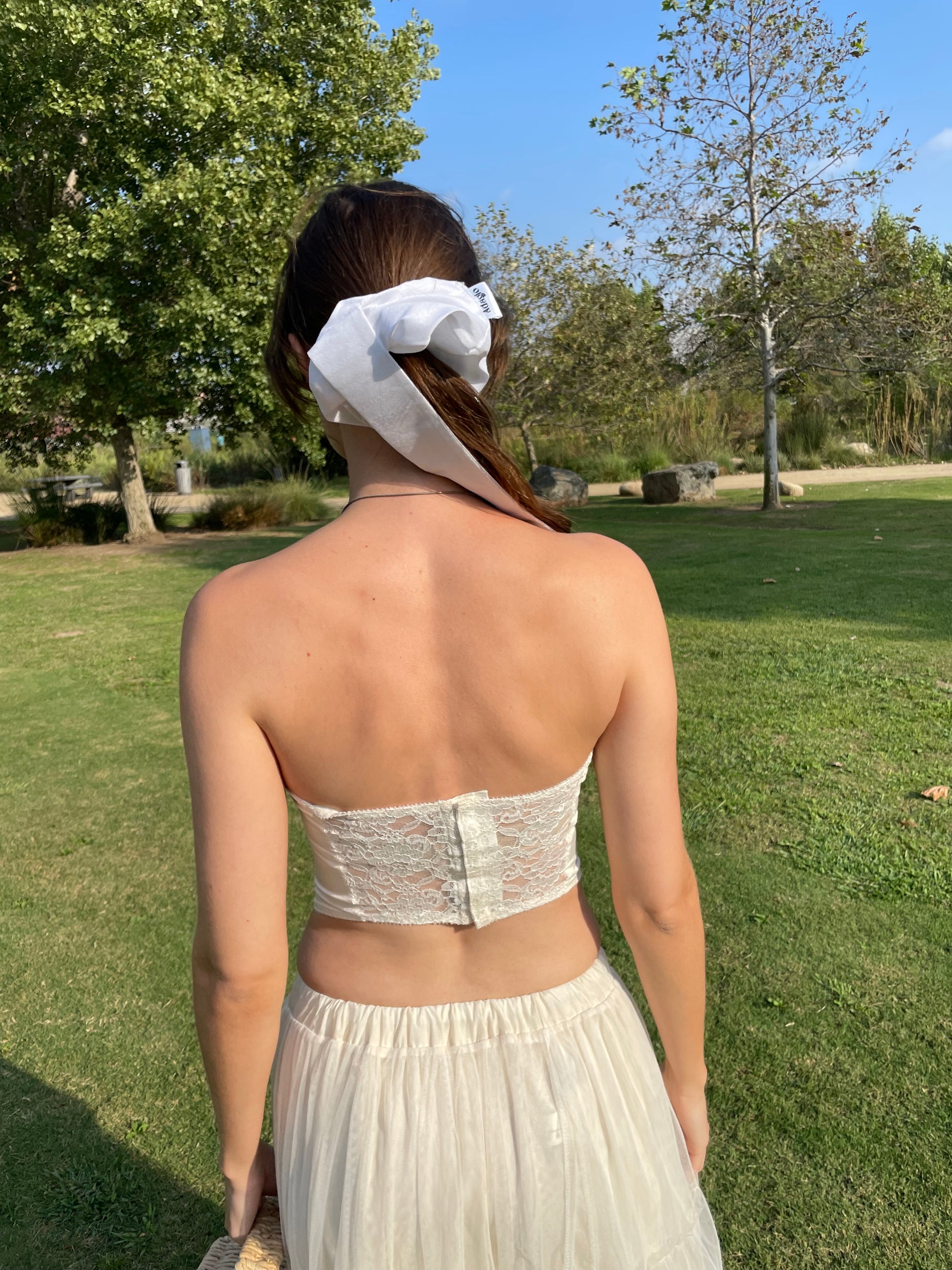 girl in white corset and tulle skirt