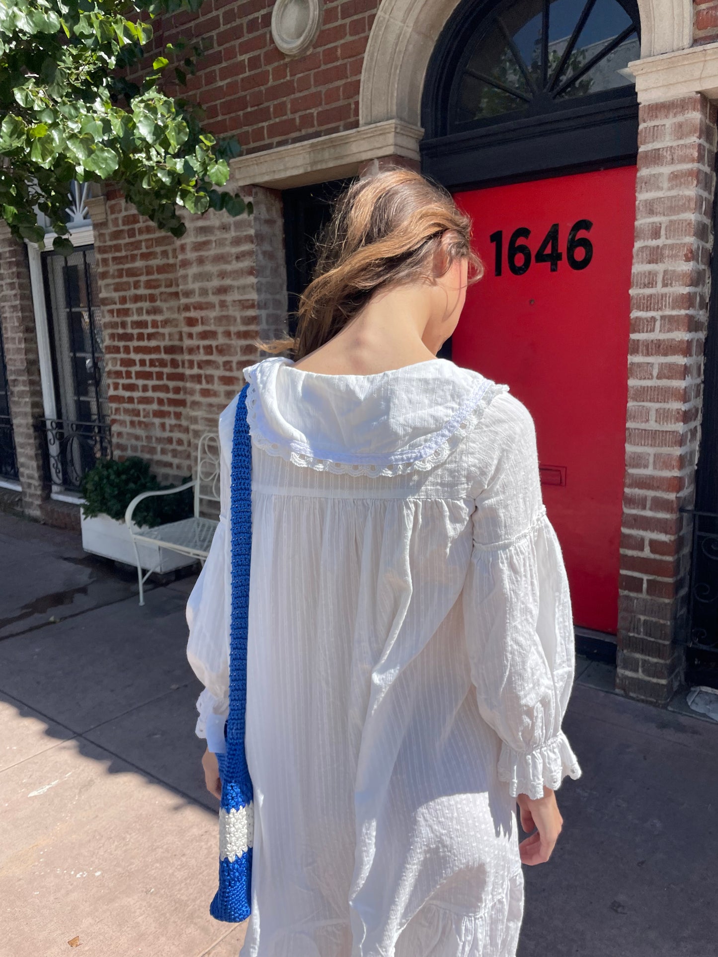 girl in long sleeve white dress