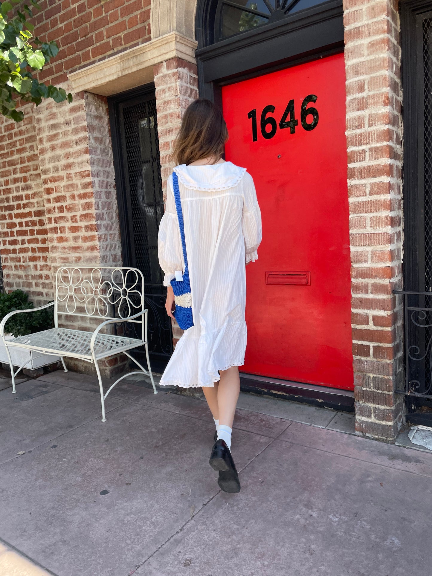 girl in long sleeve white dress