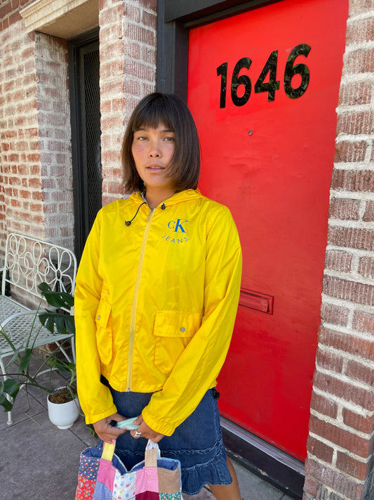 girl in yellow jacket