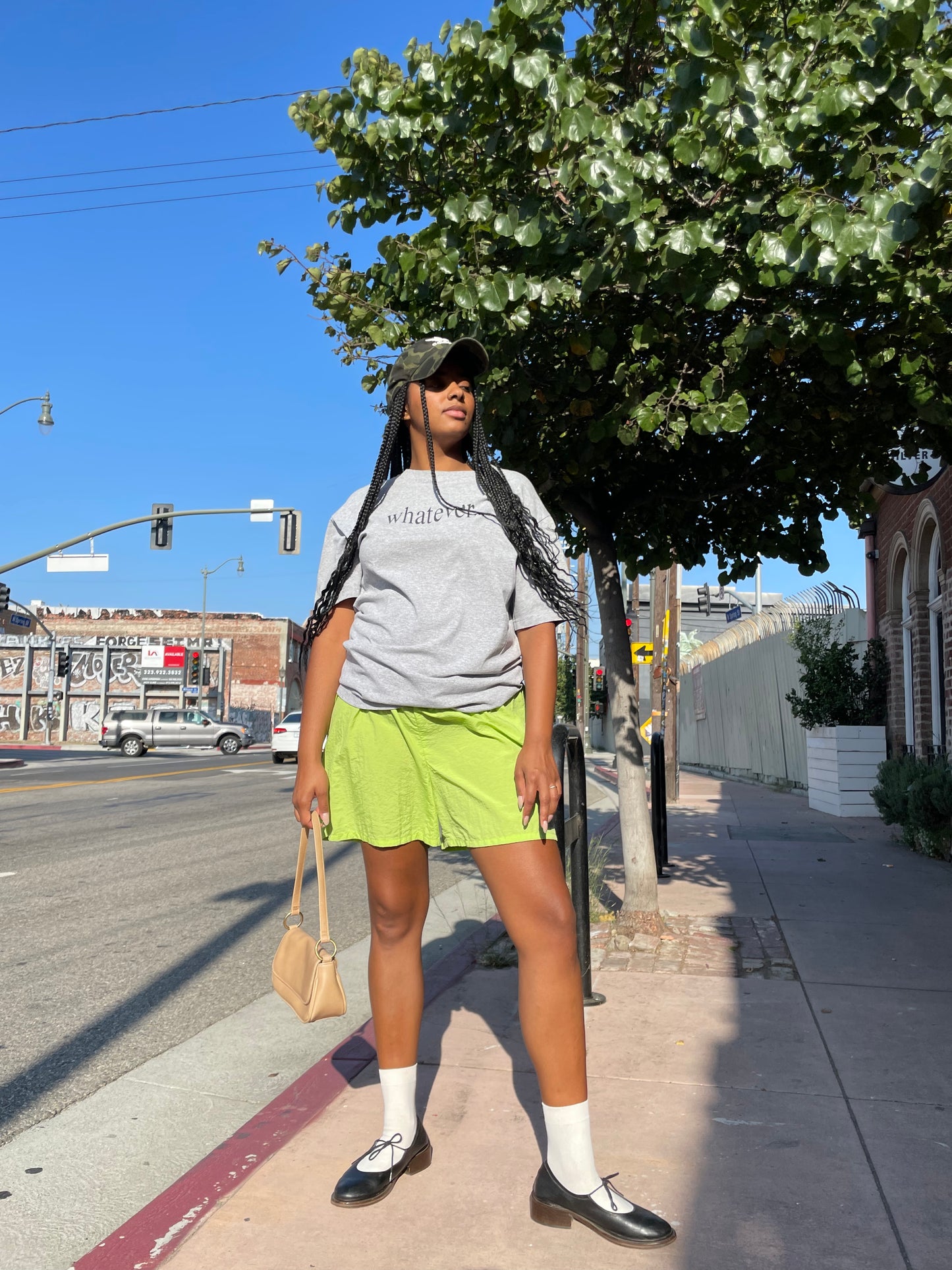 Girl wearing lime green runner shorts