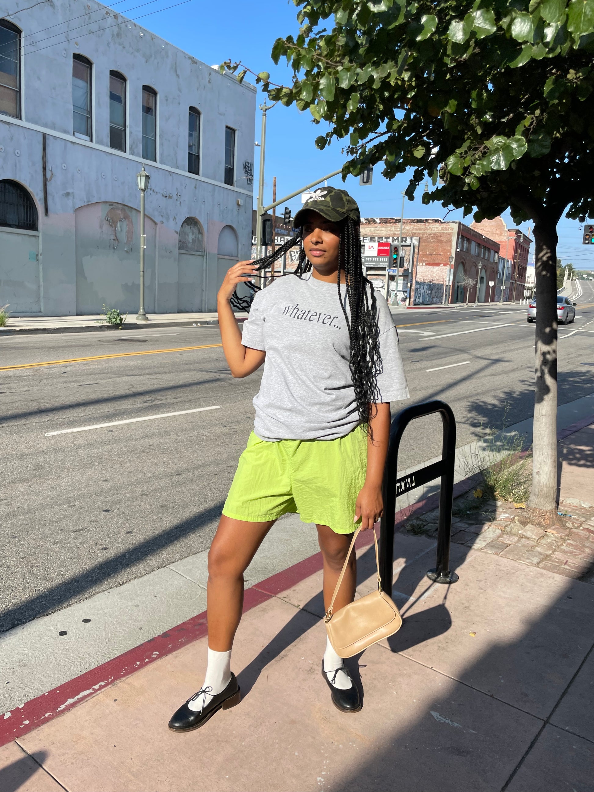 Girl wearing lime green runner shorts