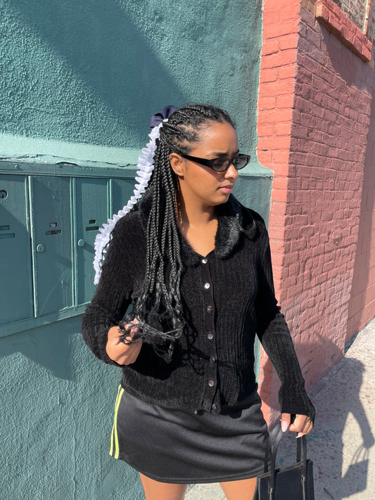Girl wearing 90s Black Faux-Fur Cardigan