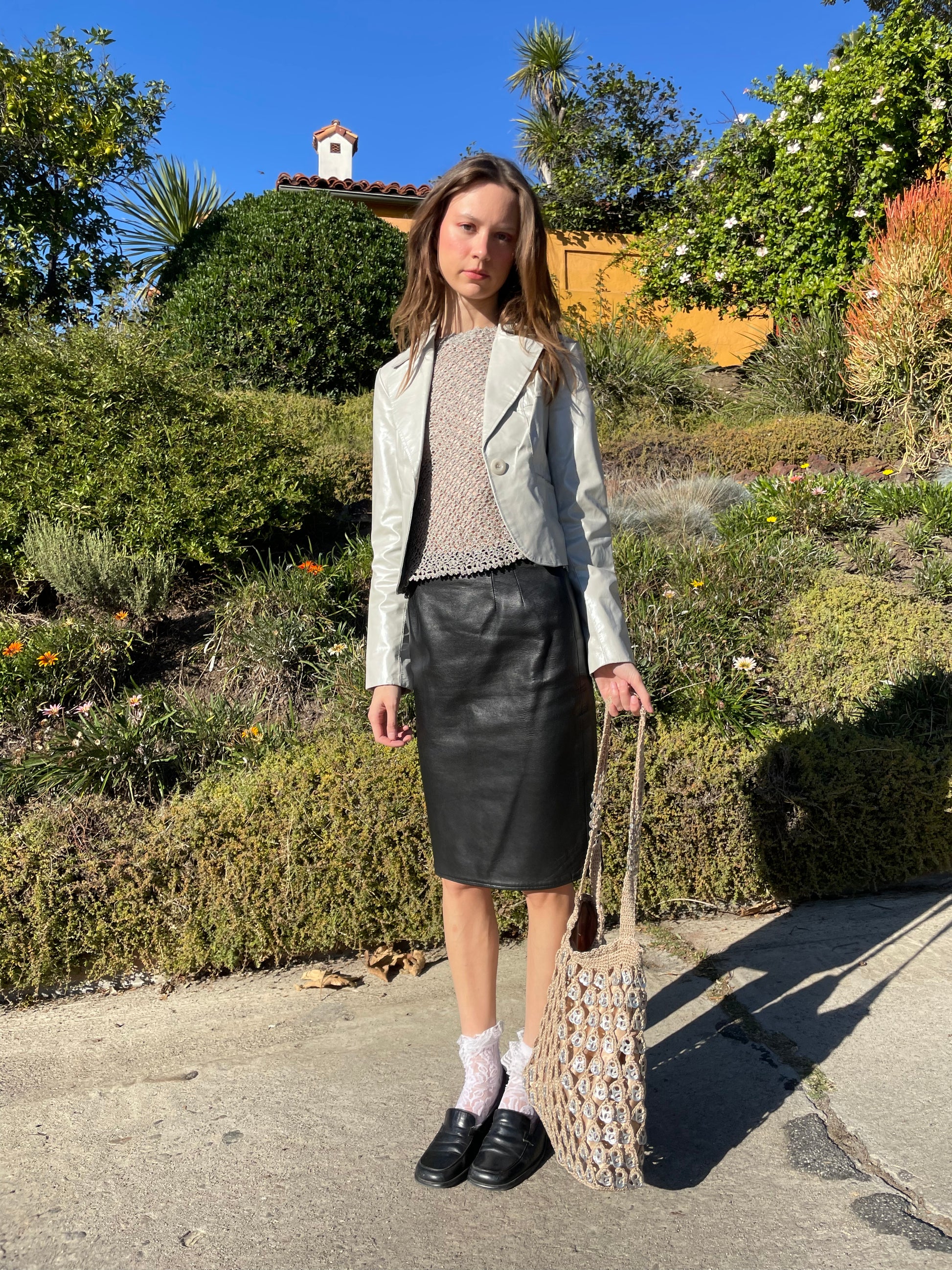 girl in silver leather jacket