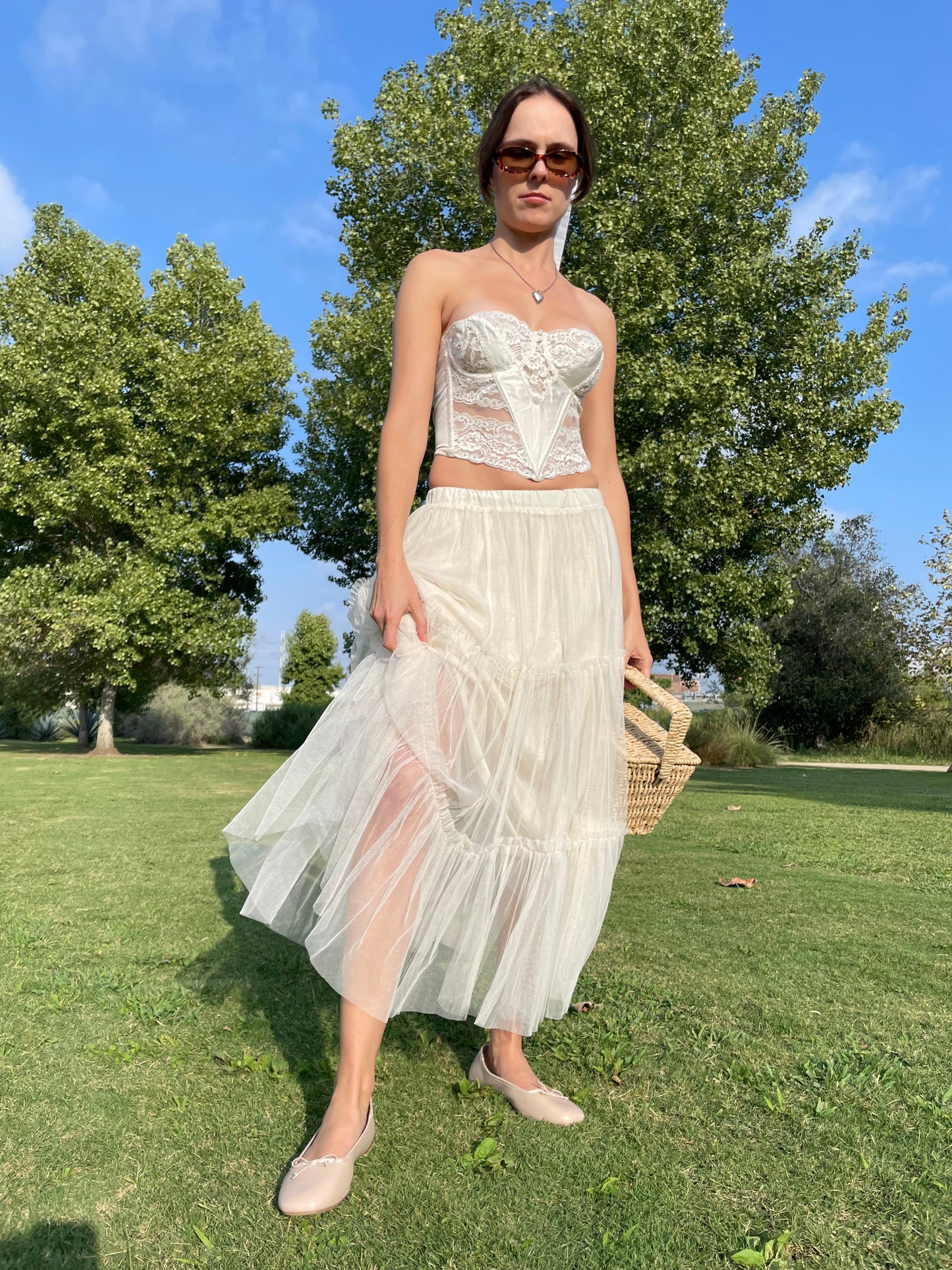 girl in white corset and tulle skirt