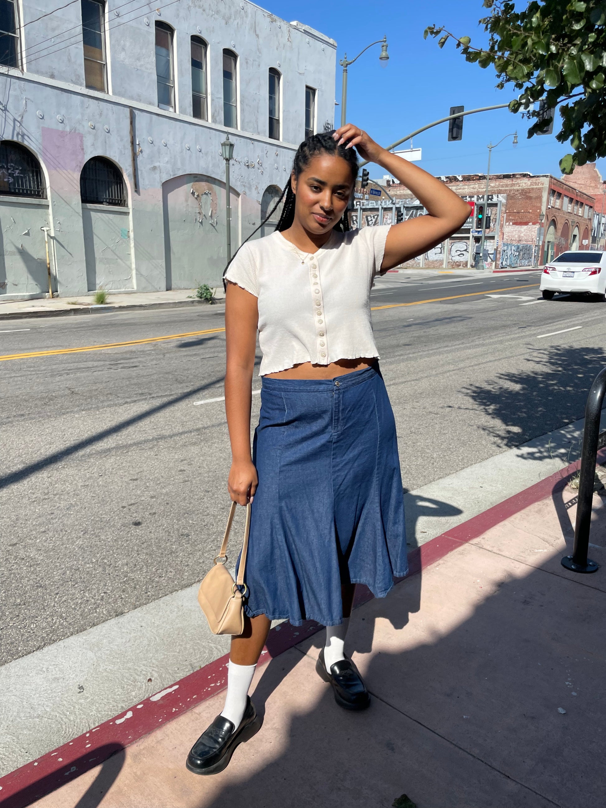 girl wearing denim skirt