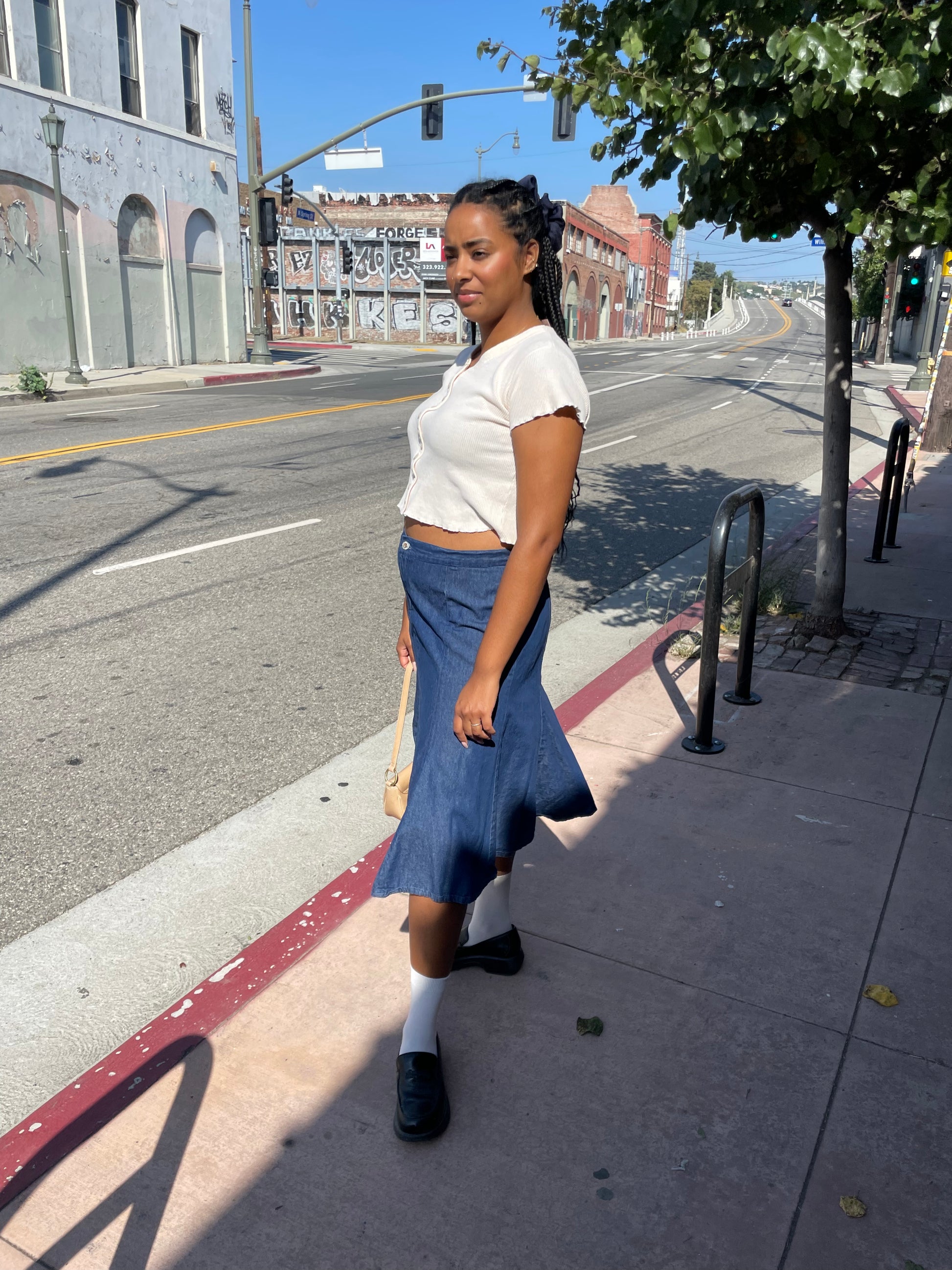 girl wearing denim skirt