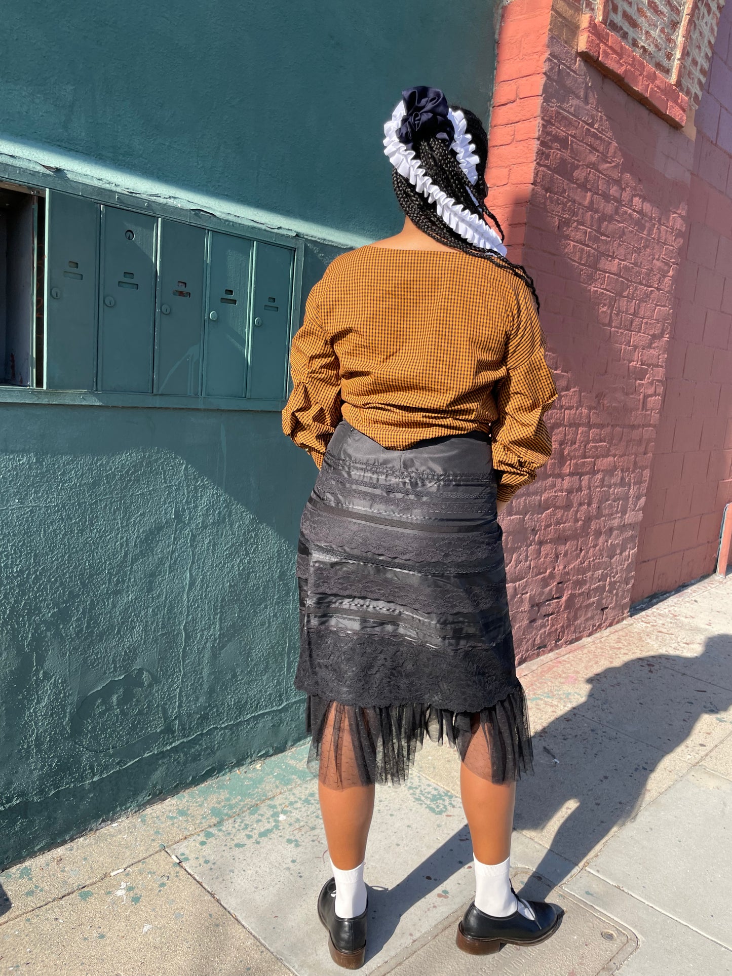 girl wearing Black Lace Tiered Skirt