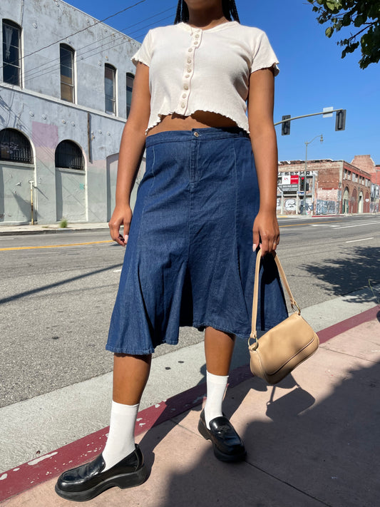 girl wearing denim skirt