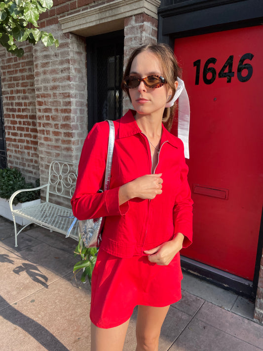 girl in red jacket and skirt