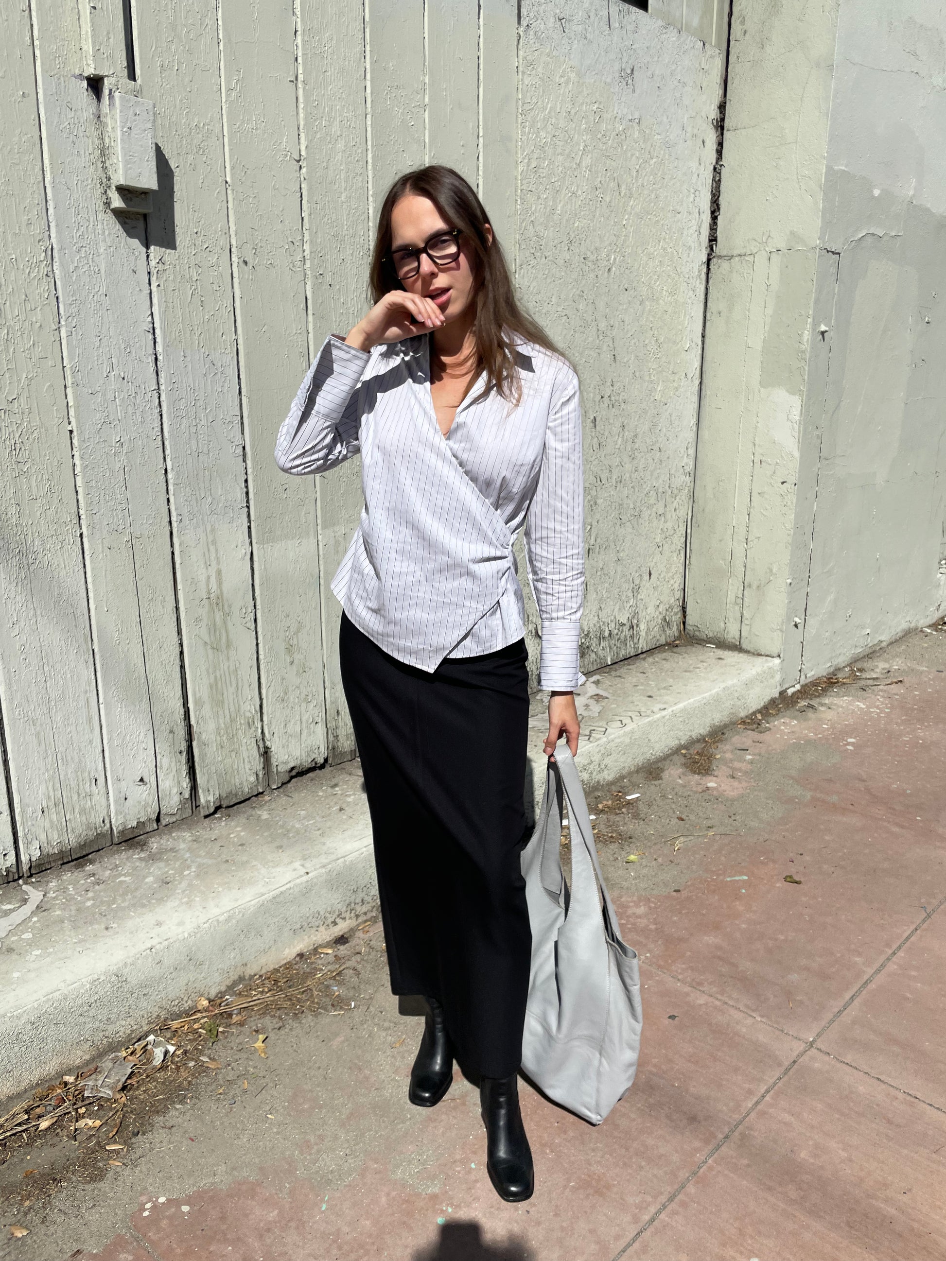 girl in long black skirt and white button up