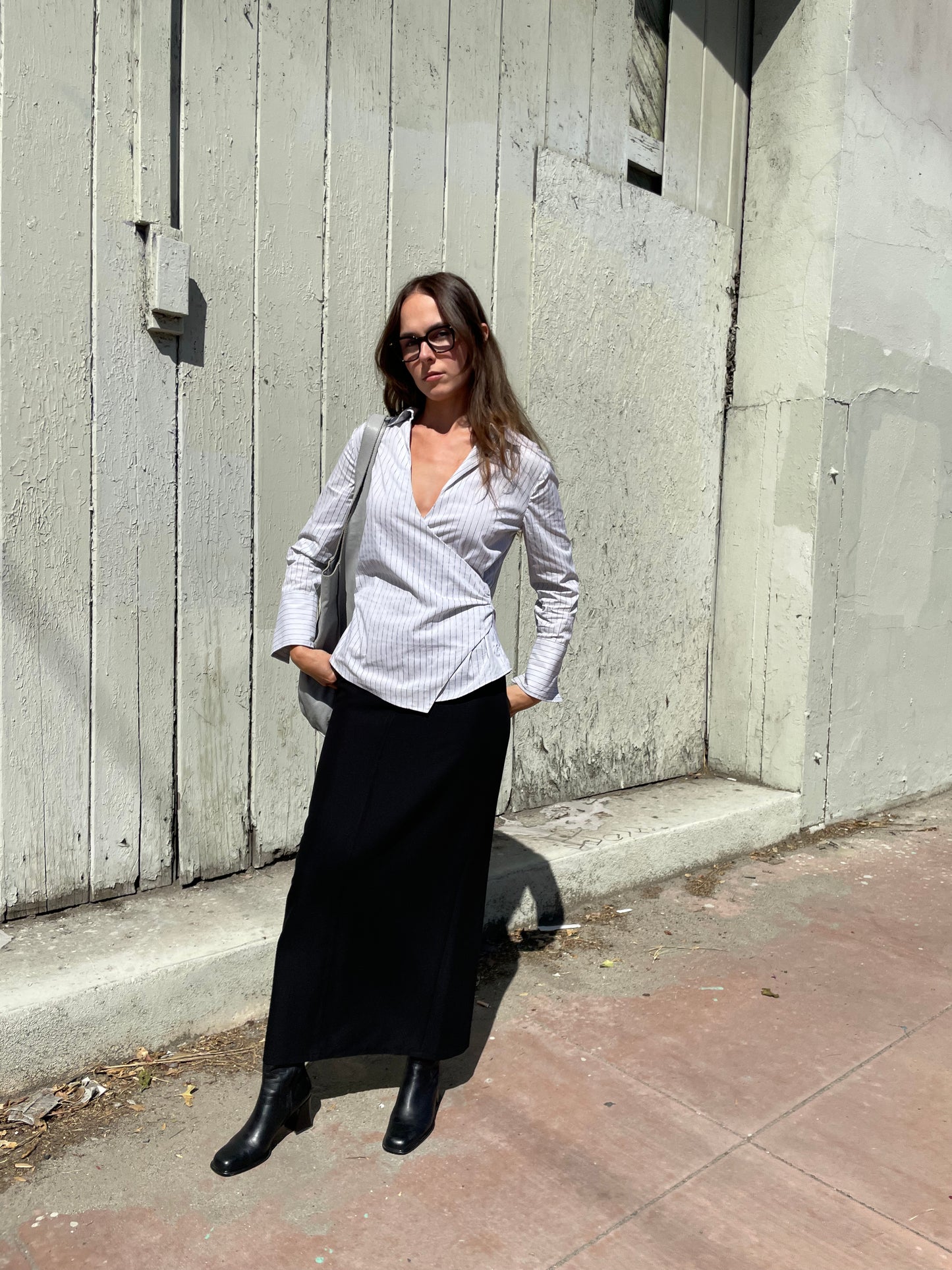 girl in long black skirt and white button up