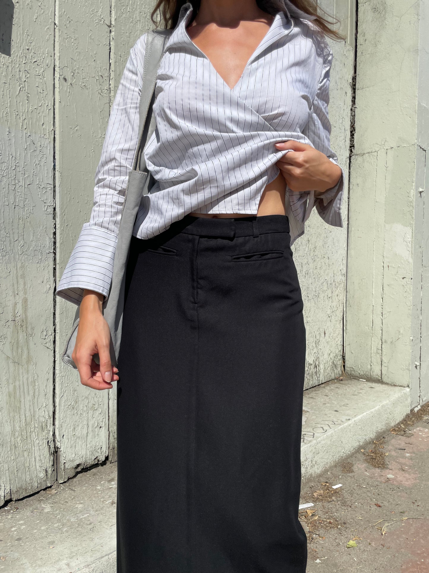 girl in long black skirt and white button up