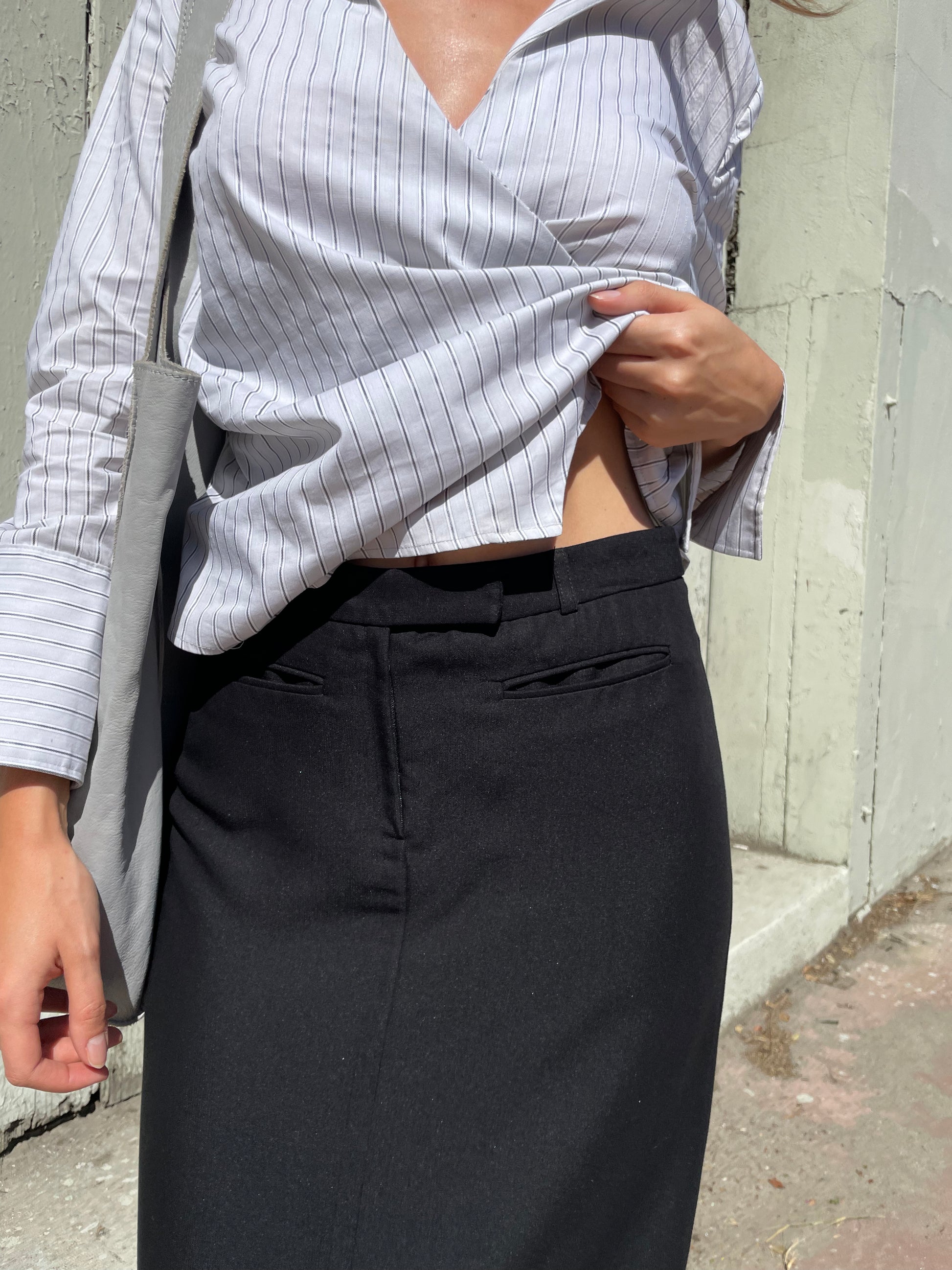 girl in long black skirt and white button up