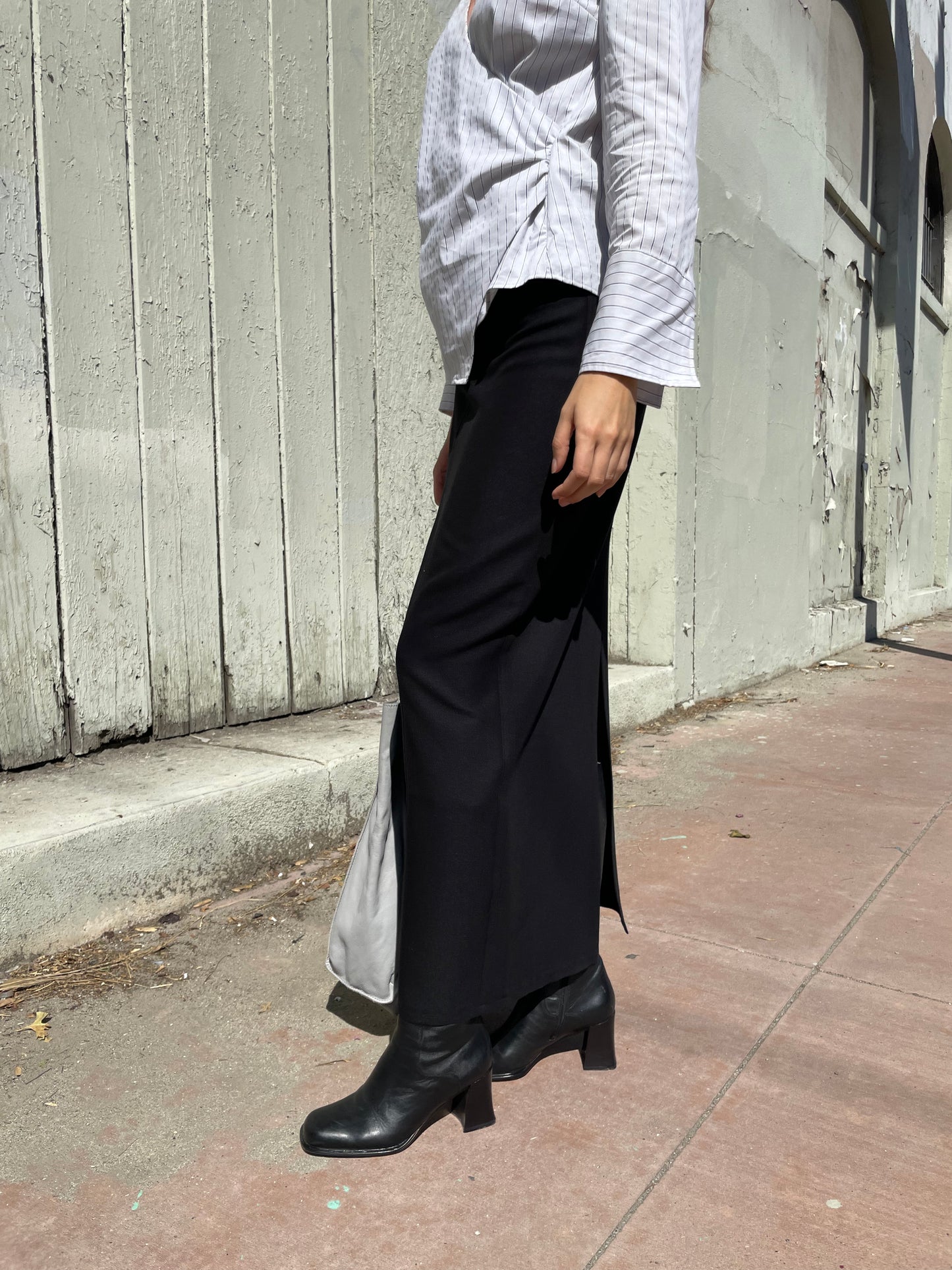 girl in long black skirt and white button up