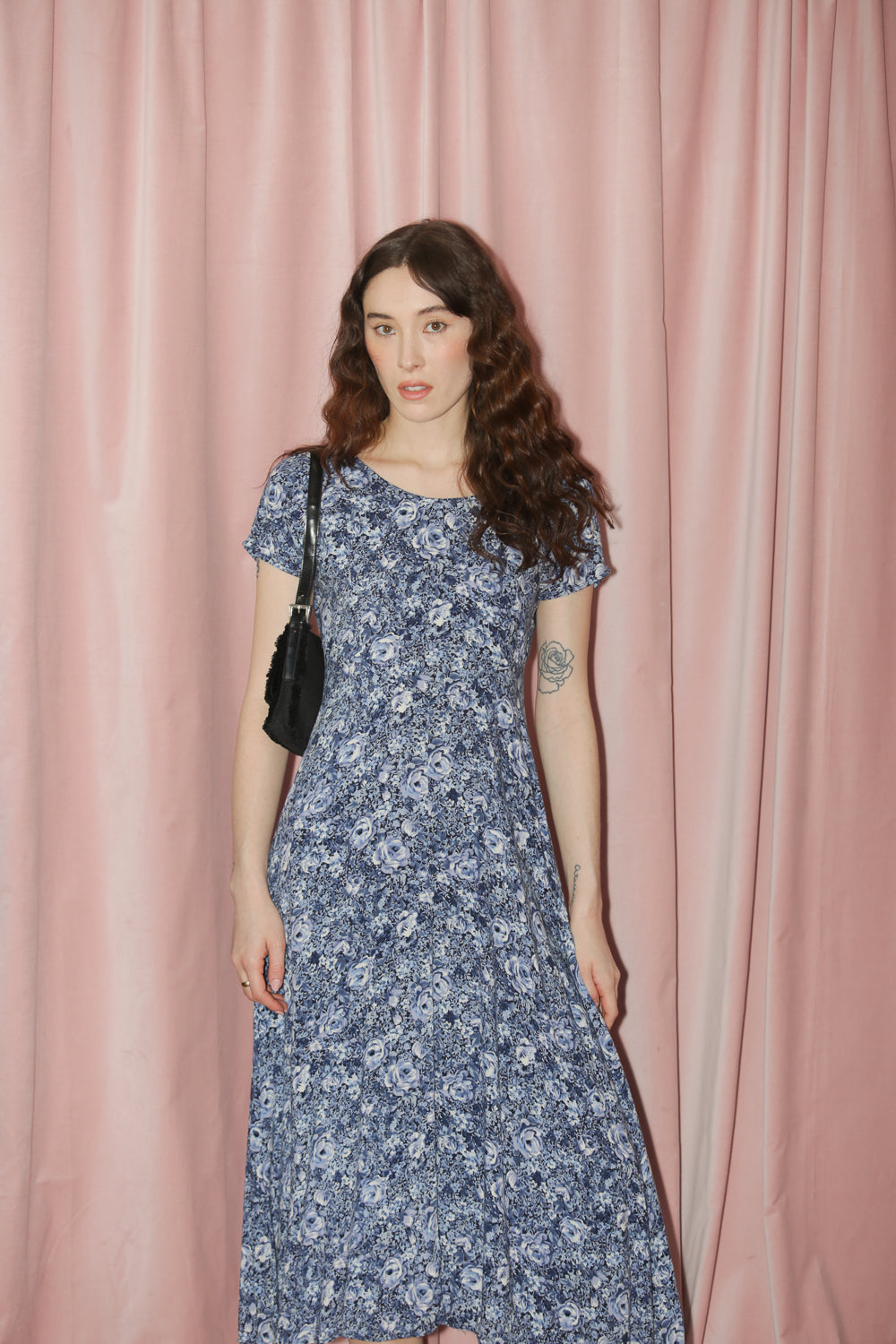 girl in blue floral dress