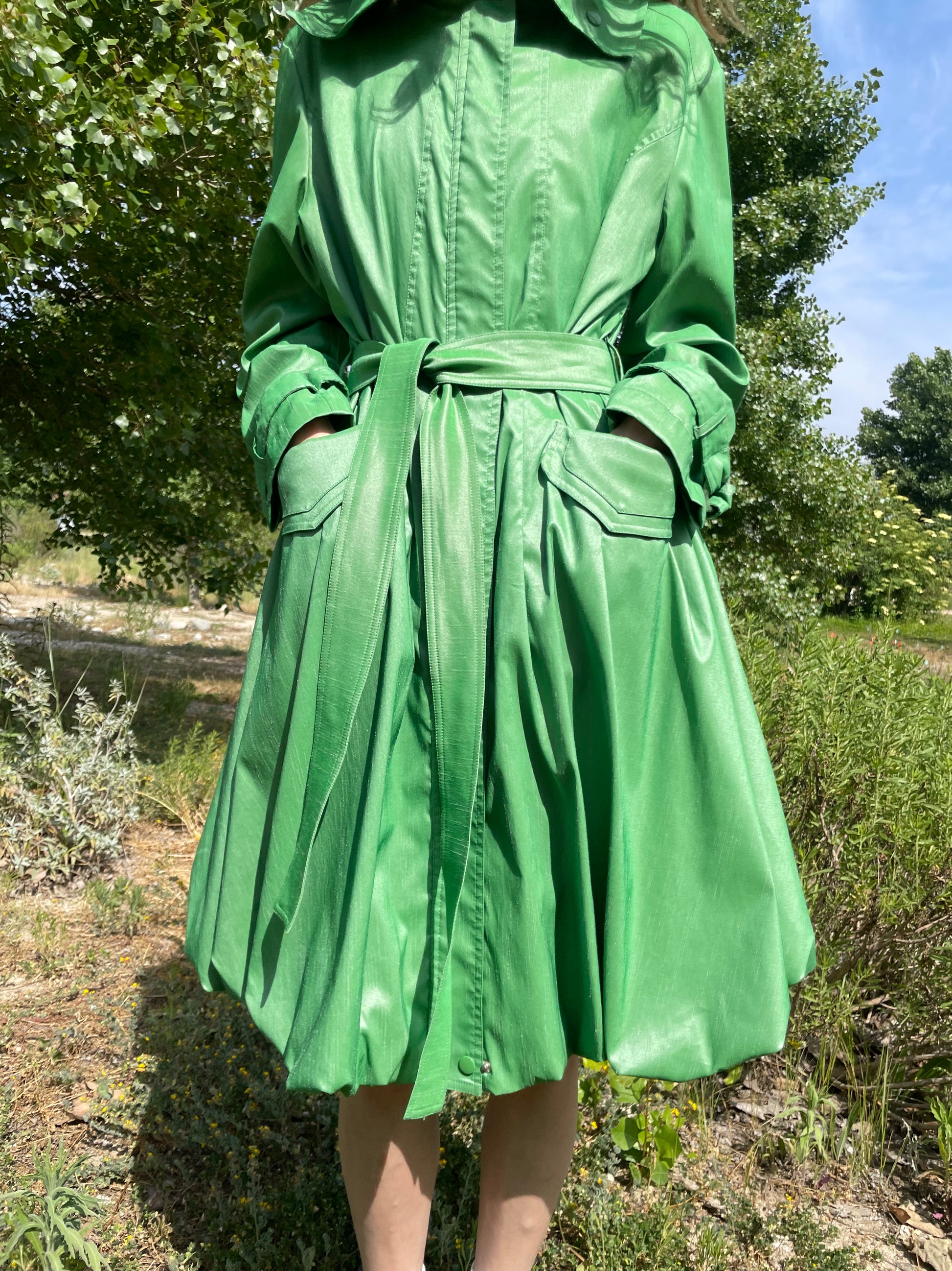 girl in green trench coat