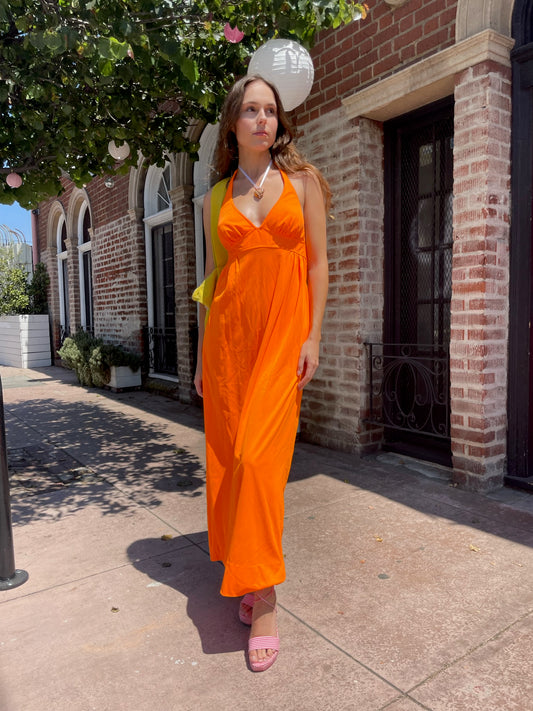 girl in orange maxi dress