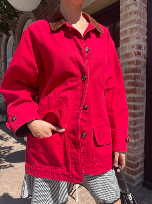 girl in red jacket and black and white skirt