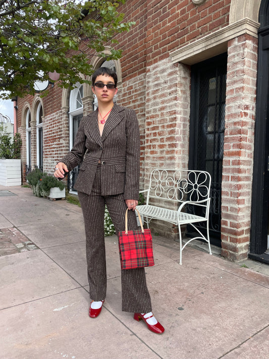 girl wearing brown blazer and slacks set