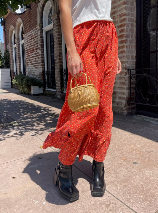 orange maxi skirt and white top