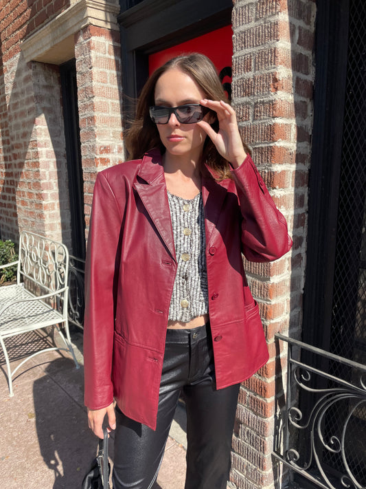 girl in red leather jacket and black leather pants