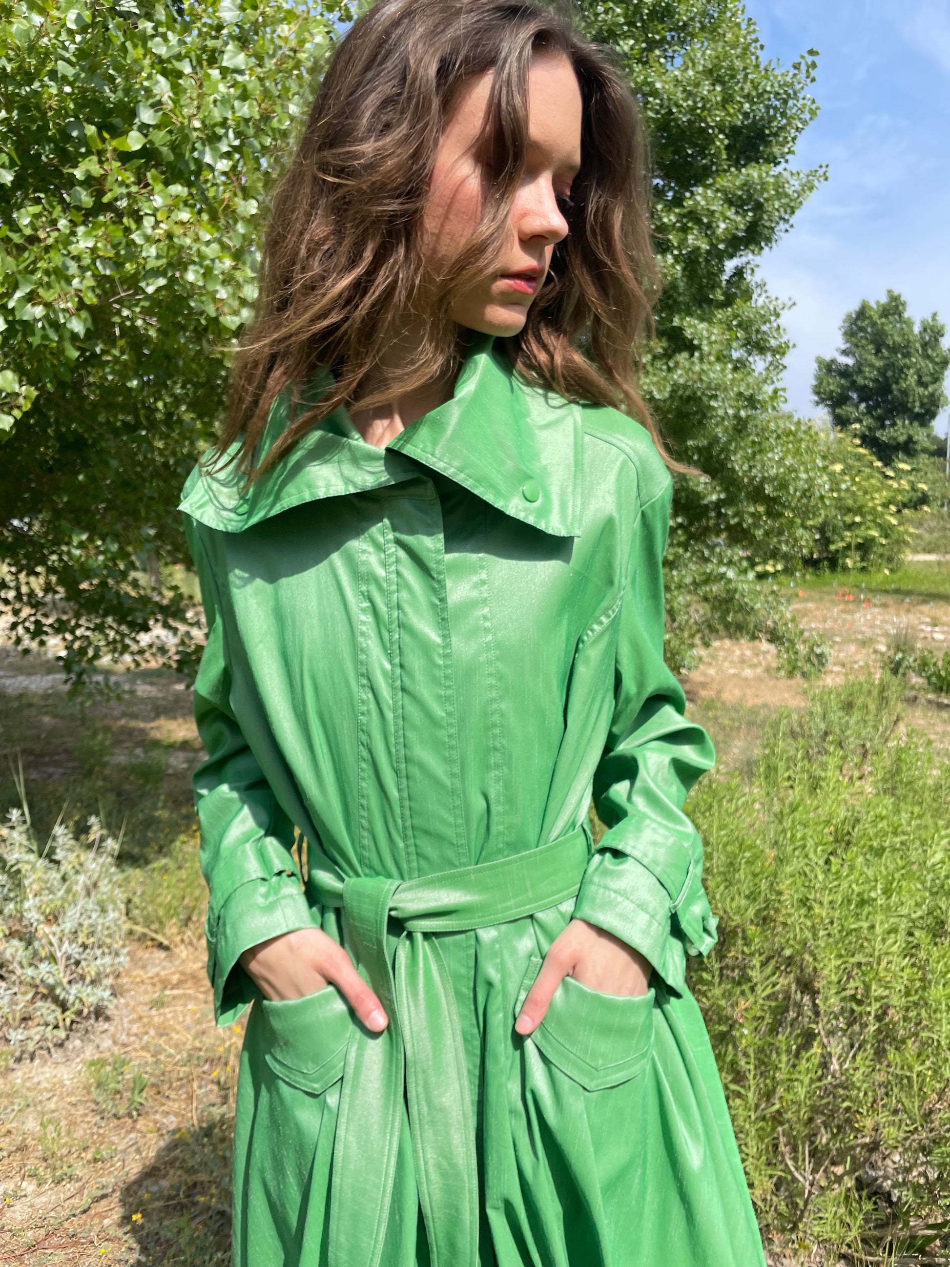 girl in green trench coat