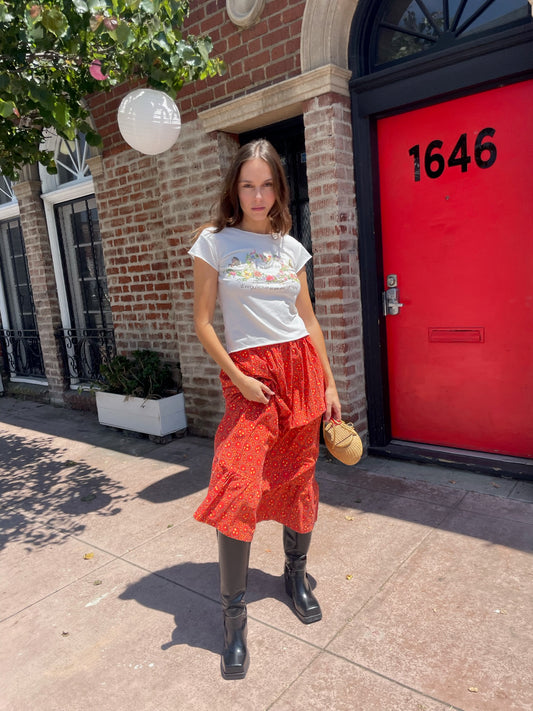 orange maxi skirt and white top