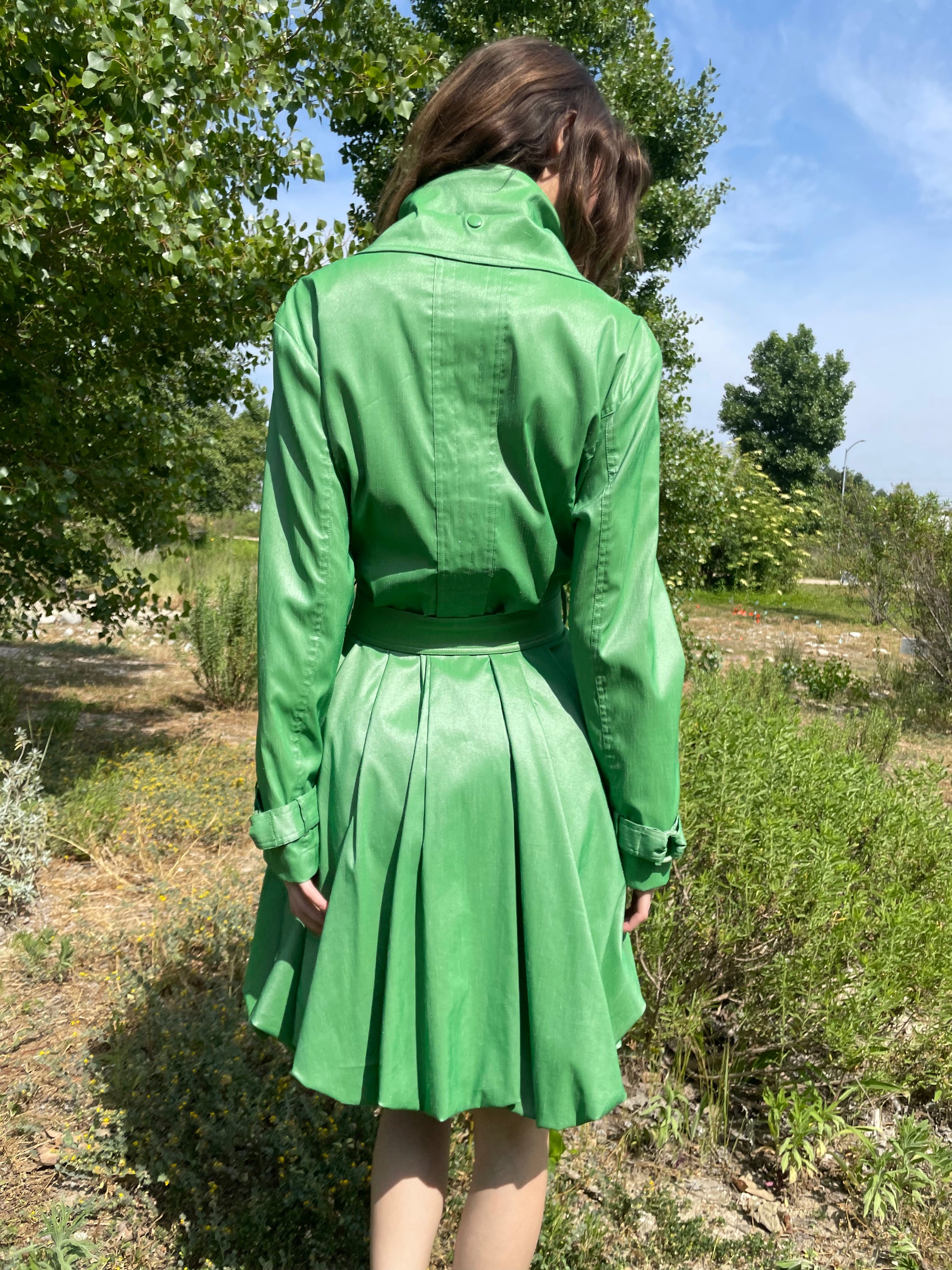 girl in green trench coat