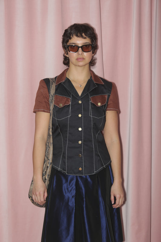 girl in Two Toned Brown & Black Blouse
