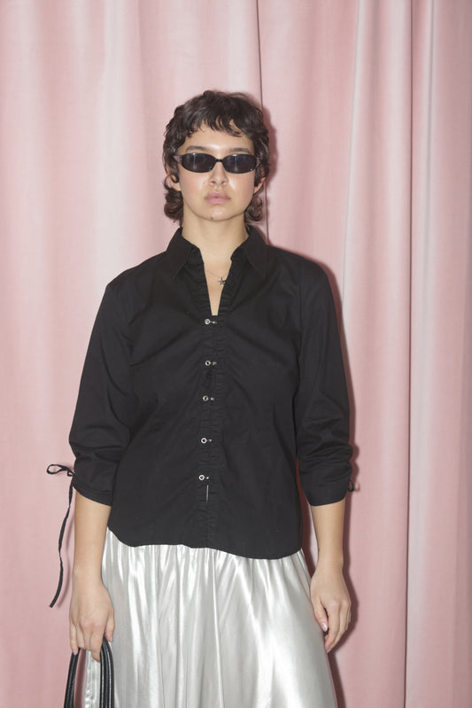 girl in black button up