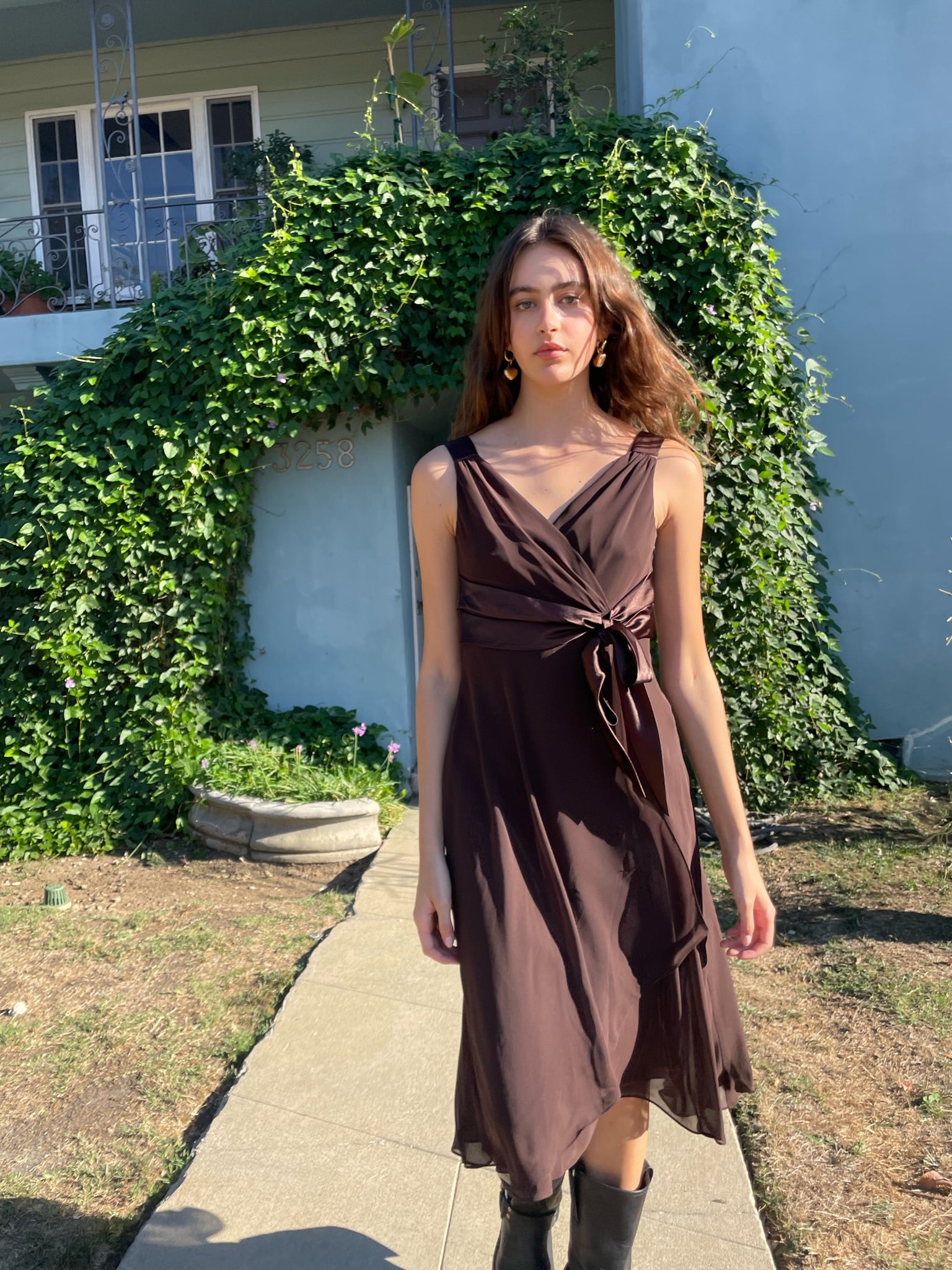 girl wearing brown dress